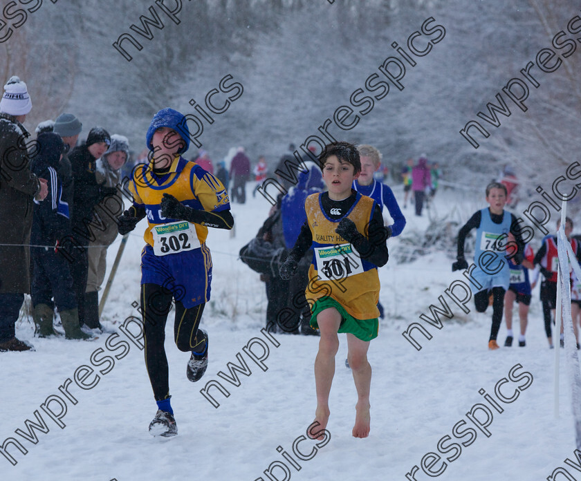 BARE FEET RUNNNER 
 U12 athlete, Aidan McCarthy (No. 301) runs bare footed in Gransha Park at the Inter-County and Juvenile Cross-Country Championships. Tom Heaney)