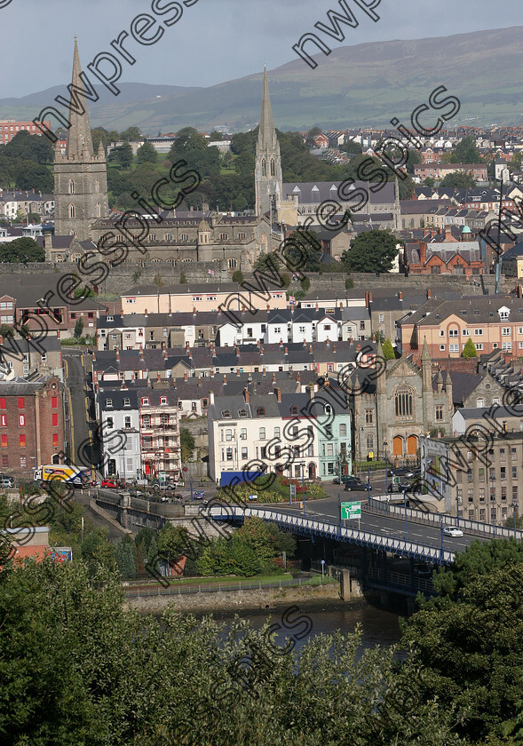 TWO CATHEDRALS CITYSIDE 
 View of Derry City from Waterside overlooking Craigavon Bridge, with the two cathedrals, St. Columb's and St. Eugene's in the background. (Photo - Tom Heaney, nwpresspics) 
 Keywords: Derry Cathedrals
Derry view